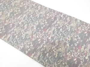 龍虎に草花模様織り出し　名古屋帯